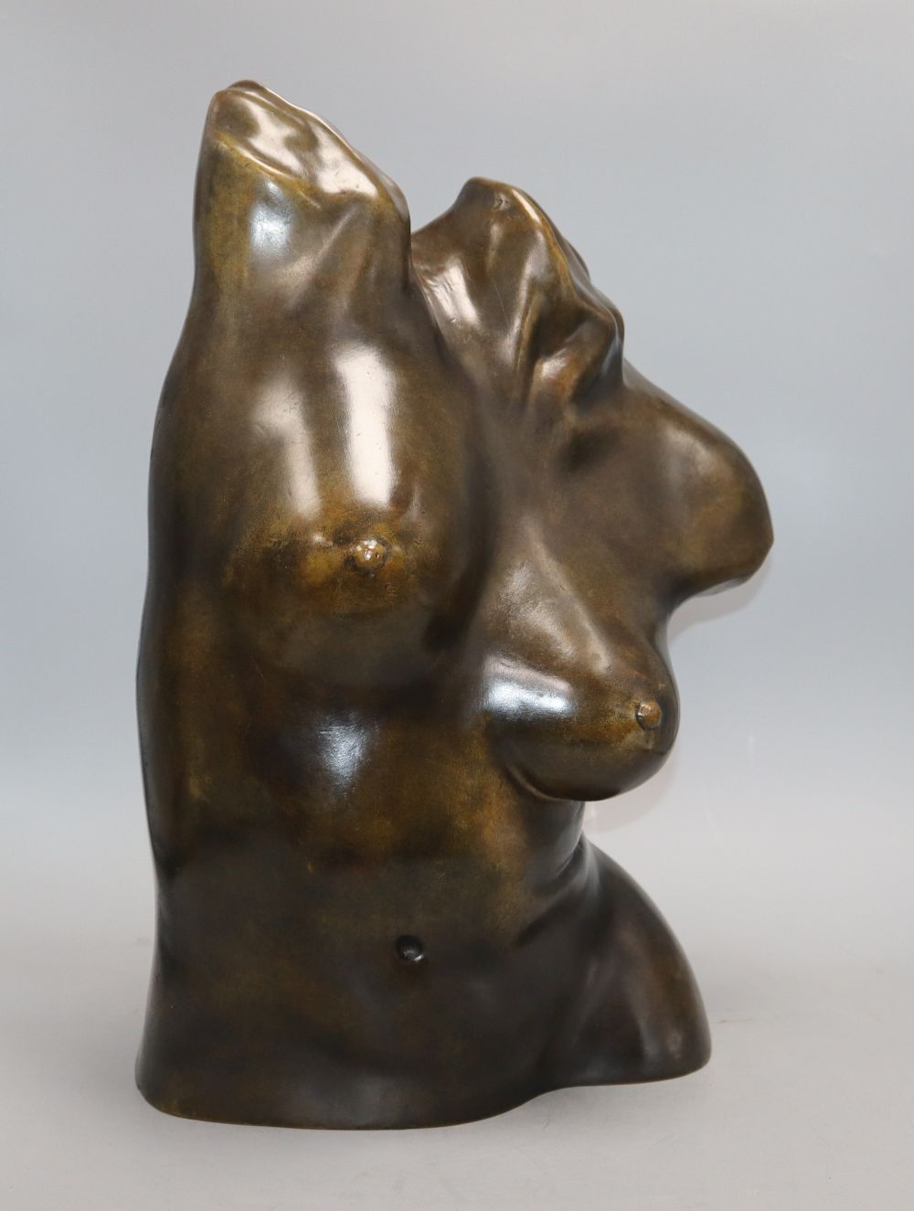 A bronze female torso, signed D. Claveric, height 47cm